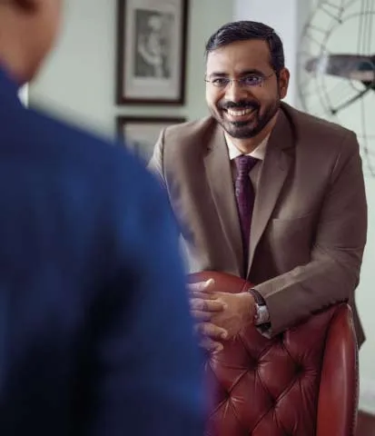 Mahindra Group - Man in a suit